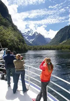 Tourists on a boat in Milford Sound