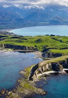 Aerial view of Kaikoura and the mountain range in the background