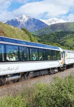 TranzAlpine scenic train heading towards mountains