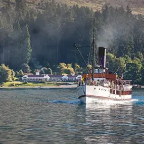 The TSS Earnslaw steaming away from Walter Peak station