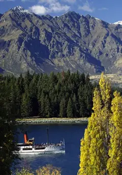 TTS Earnslaw cruising the lake Wakatipu under Remarkables mountain range