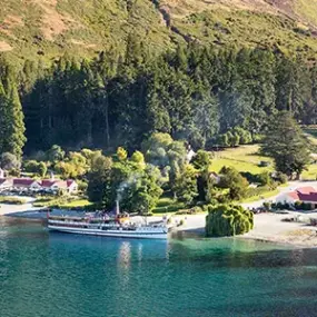 The TSS Earnslaw steam ship docked at Walter Peak station