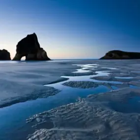 Rock formations in Nelson at sunset